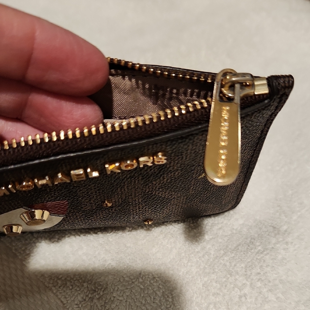 Michael Kors Black Wristlet with Rocket and Star Design - Picture 5 of 7